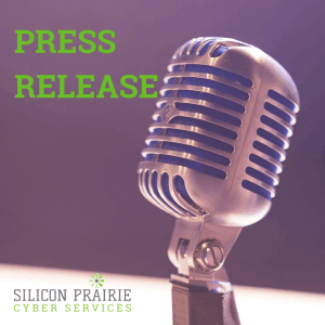 Press Release next to Micorophone. Silicon Prairie Cyber Services Logo